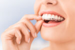Dental Patient Wearing Invisalign Clear Aligners
